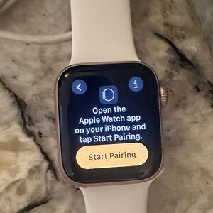 Apple Watch with White Sport Band and Rose Gold Case